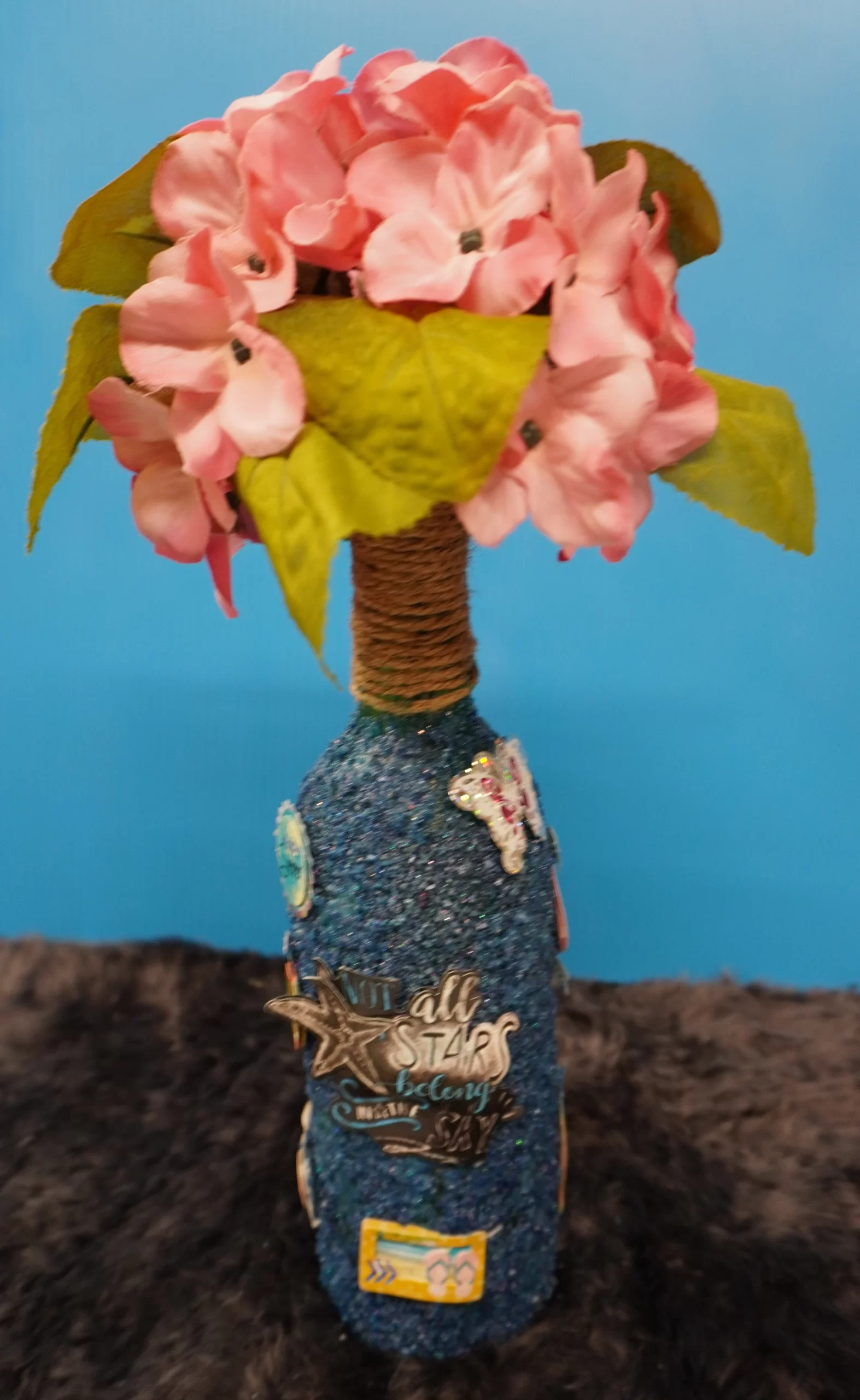 Bottle face blue with pink flowers - Copy - Copy